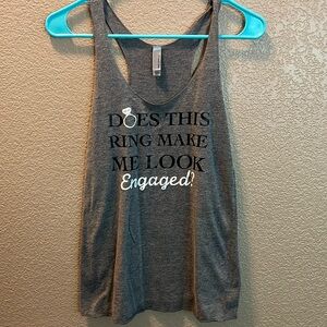 Next Level Apparel tank top size small: “Does this ring make me look engaged”